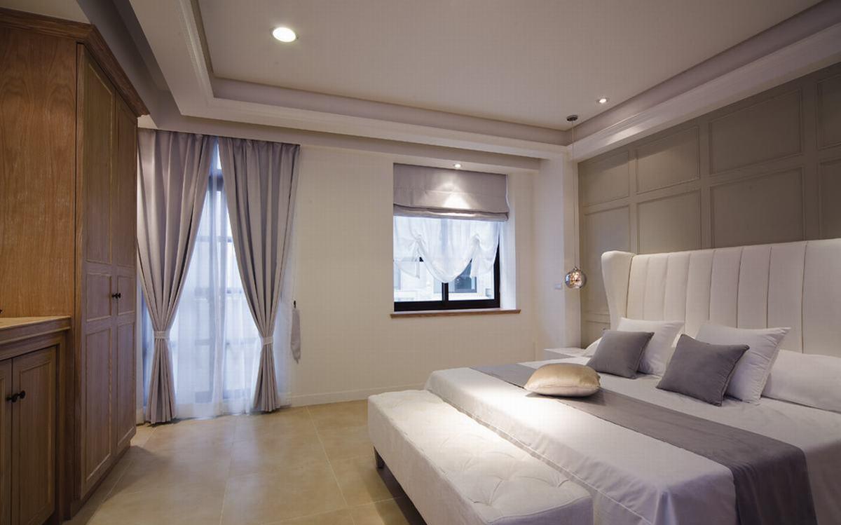 床头与主墙面以美式古典意象的线条结合陈述休憩空间的优雅于舒适。