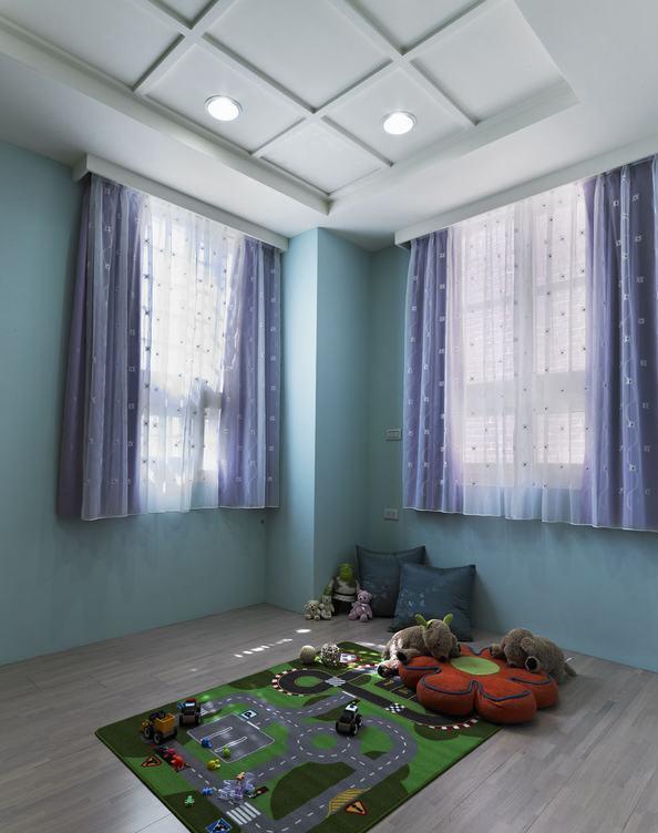 二楼其中一间套房，现作为小朋友的游戏区，填满童趣的蓝绿色，未来可作为客房。