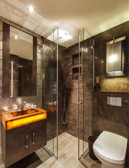 洗澡真的不想在一个狭窄的空间里，于是为淋浴间留出了稍多的面积，干湿分离的设计使用放心而方便。地面和墙面统一色系的深浅呼应风格一致的简洁大气。