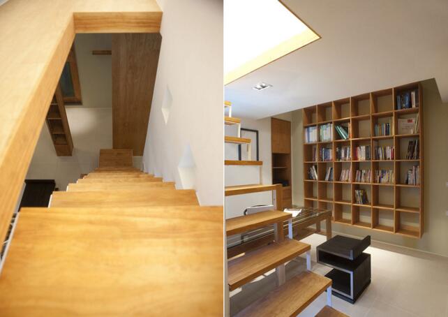 书房营造了穿透性的空间，设置在楼梯旁，利用三根木柱做为隔间钢构的楼梯具有延伸性，楼上创造出了闲置空间。