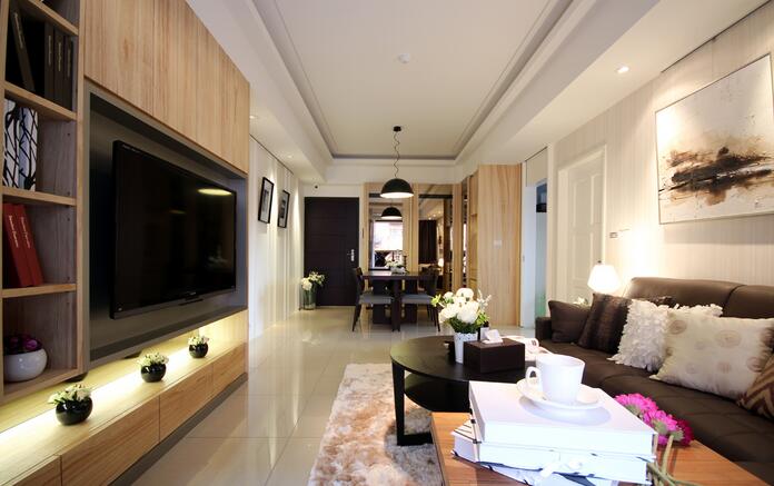 客厅空间以开放的通透空间，强调光影的串流变化。