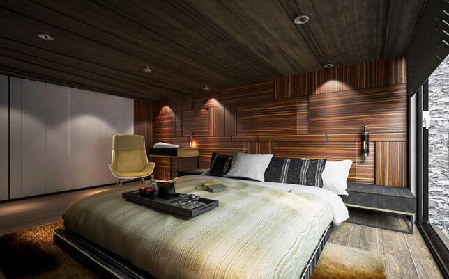 卧室床头墙面交错的木纹拼接设计，凸显高端商务气质。在吊顶以及床品等地方都采用了类似的条纹设计，整体风格处处呼应。