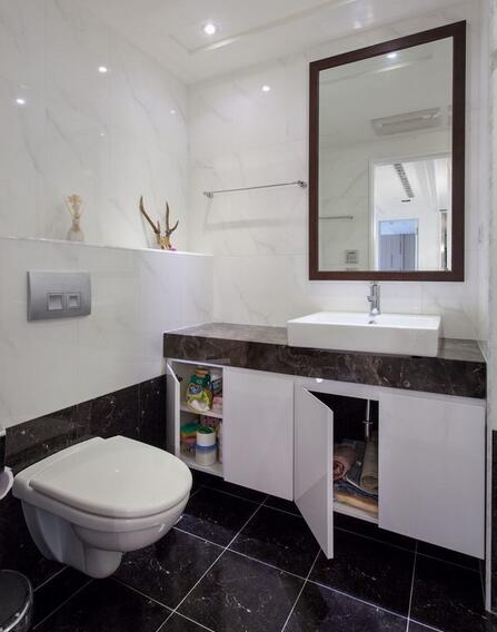 卫浴空间以黑白色石材，打造出简约大器的空间质感。