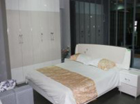 欧情家居实木床的图片