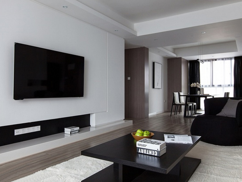 极为简洁的背景墙，在简单的布置中让客厅更为开阔。