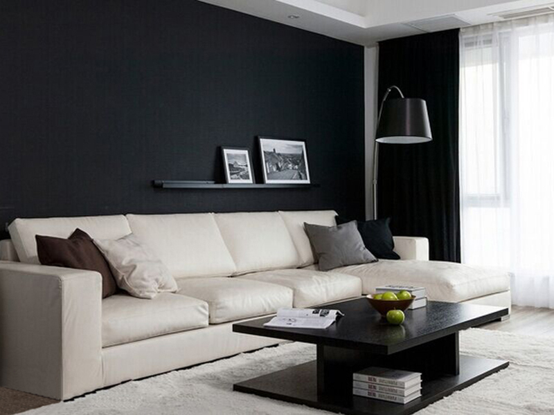 一套造型简洁的沙发，搭配线条流畅的落地灯，静态中也有动态的体现。