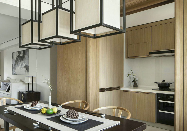 开放式厨房，木质板材的外延使得厨房与整体空间浑然一体。