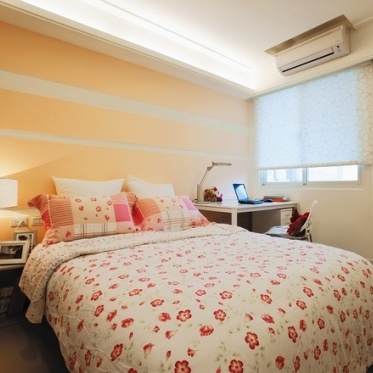 现代风格个性橙色卧室设计...