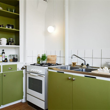 简约风格绿色厨房装修效果...