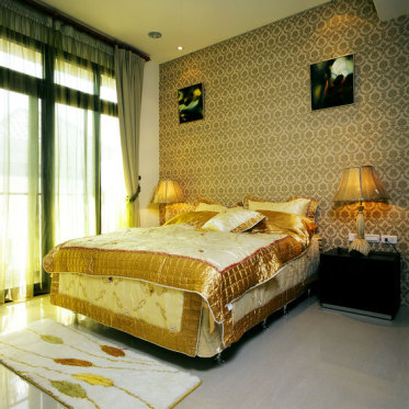 黄色东南亚风格卧室装修效...