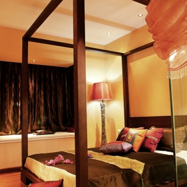 中式风格温馨橙色卧室装饰...