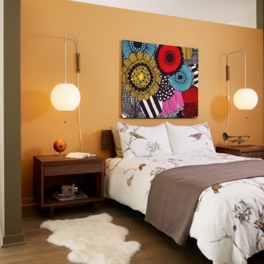 个性创意橙色简约卧室装潢...