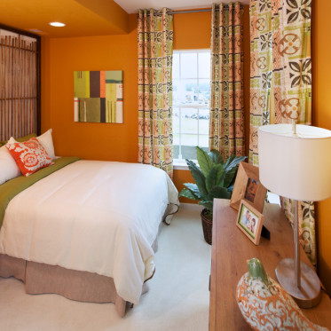 橙色个性现代风格卧室装修...