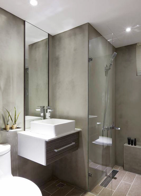 部分空间让渡除了加乘功能完备的卫浴使用，水泥粉光漆的无接缝与长条型木纹砖呼应，小空间亦有大特色。