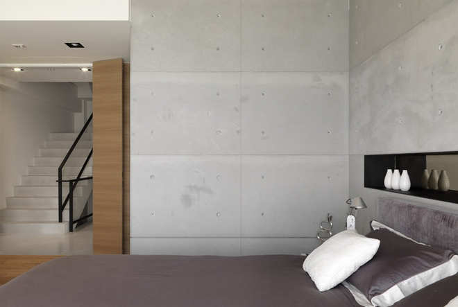大水泥块做卧室墙面，风格硬朗。